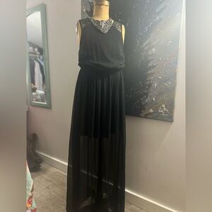 Black lace back sheer dress and statement necklace